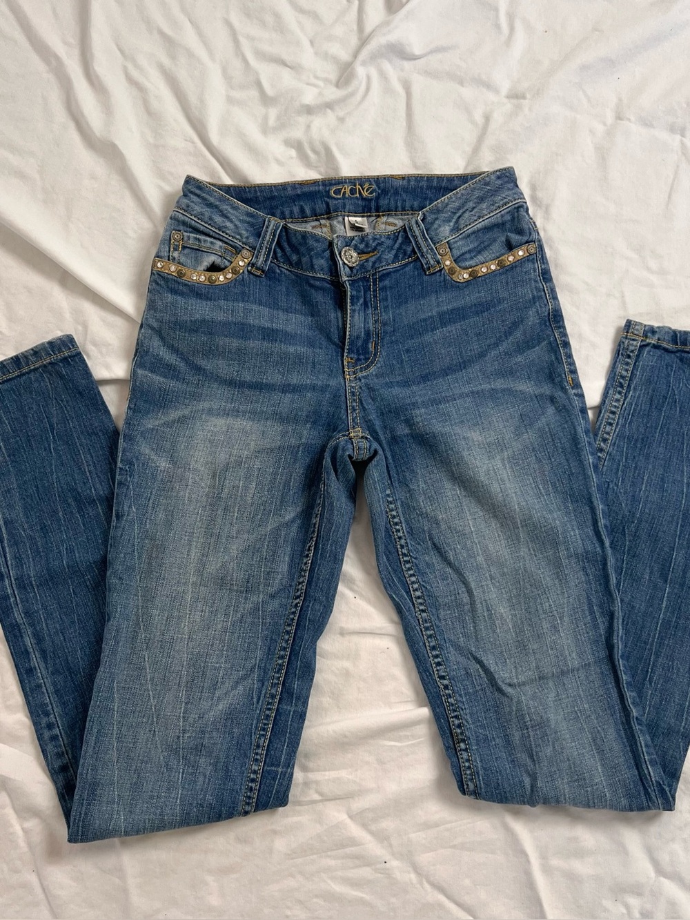 Vintage Y2K Cache blue low rise skinny jeans with gold studs. Size 0